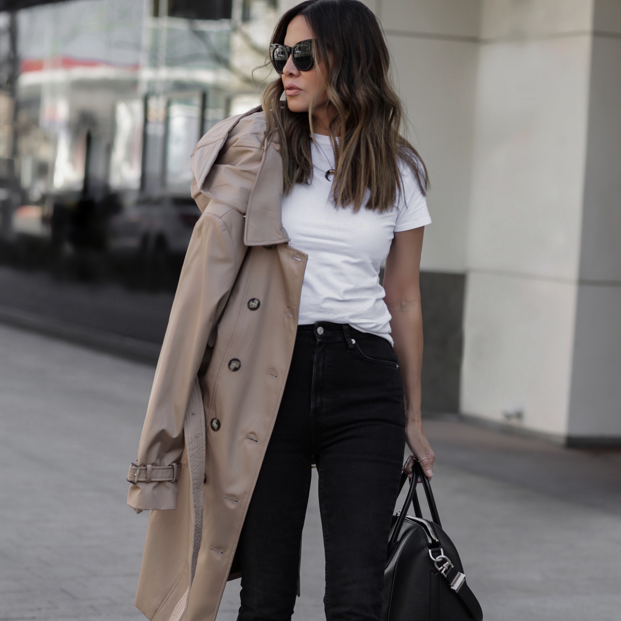 spring fashion trends 2019, spring fashion trends on a budget, lolario style blogger in black jeans and trench coat